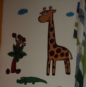 The bedroom wallpaper with cartoon animals that inspired the logo